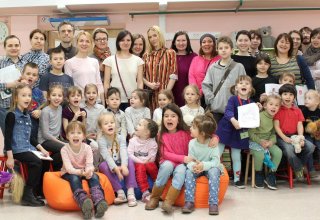 Общая фотография детей и родителей после заседания